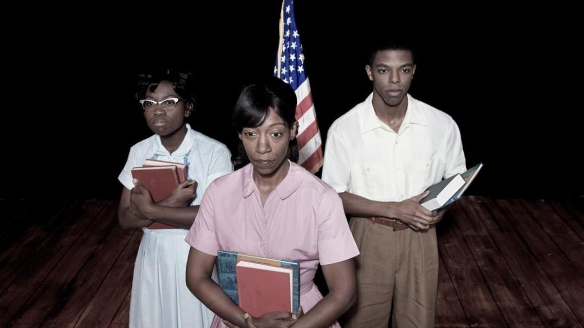 Black students (from left, Rasheedat “Ras” Badejo, Dianne Yvette and Donovan Woods) are among the Little Rock Nine who integrated an Arkansas high school in 1957.
