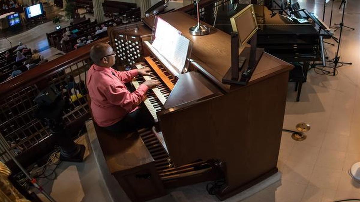
Mario Pearson, principal organist at the Cathedral of the Immaculate Conception, has enhanced the church’s Ruffatti organ with digital samples of music from France. Pearson has assembled a team of area musicians to show off the organ at this year’s French Organ Festival.
