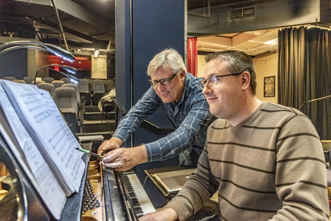 Playwright Terence O’Malley (left) runs over the score with music director Daniel Doss during a rehearsal for “Nelly Don: The Musical” at MTH Theater in Crown Center.