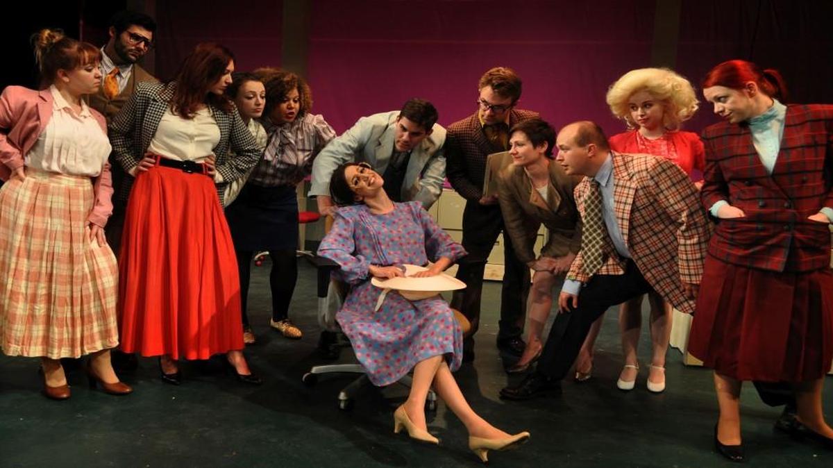 The office workers in “9 to 5: The Musical” are played by (from left): Deanna Barron, Jeff Smith, Leah Swank-Miller, Chelcie Abercrombie, Olivia Cabrera, Scott Salem, Katie Karel, Michael Golliher, Lauren Pope, Andrew Brown, Hannah Freeman and Cori Anne Weber.