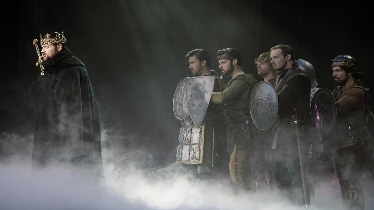 
Adam Grabau portrays Arthur, followed by his troops, in “Camelot” at Starlight Theatre.
