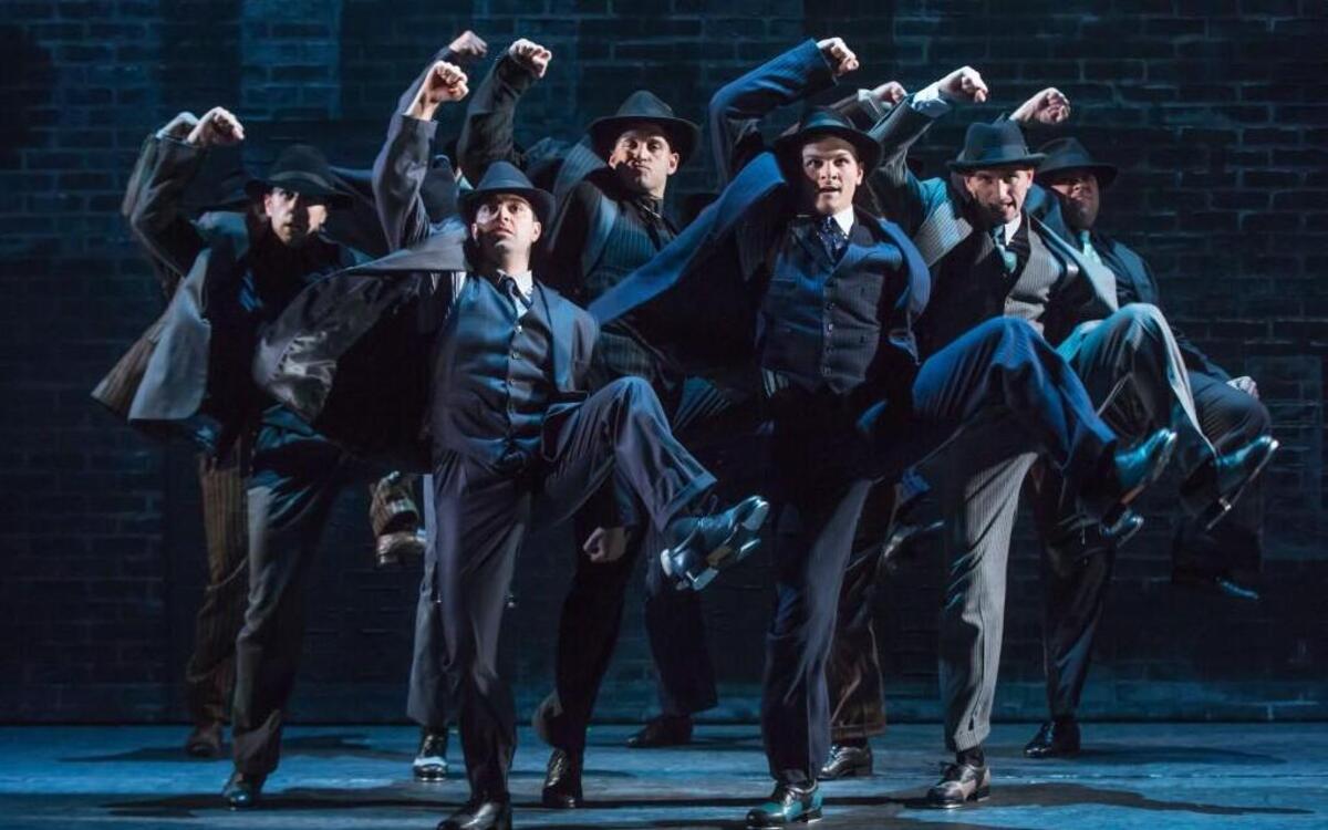 Director/choreographer Susan Stroman says her favorite scene in “Bullets Over Broadway” is when the gangsters go all out tap dancing. Cheech (Jeff Brooks, second from left) is a mobster with a creative heart.