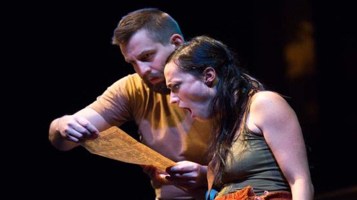 
Rusty Sneary and Vanessa Severo play the hapless title characters in Tom Stoppard’s “Rosencrantz and Guildenstern Are Dead.” Late in the play they read a letter that tells them of their fate..
