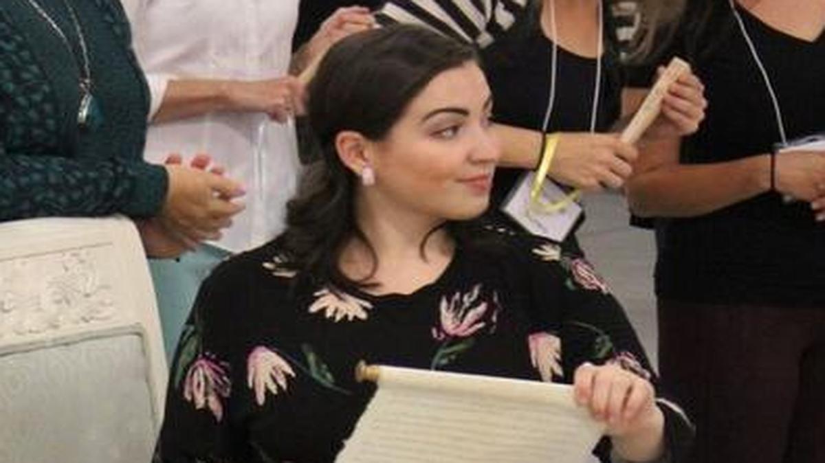 Lawrence native Raquel Gonzalez (seated) rehearses a scene for the Lyric Opera of Kansas City’s production of “Eugene Onegin.” Gonzalez is playing Tatyana in her first role since graduating from Washington National Opera’s young artists program.