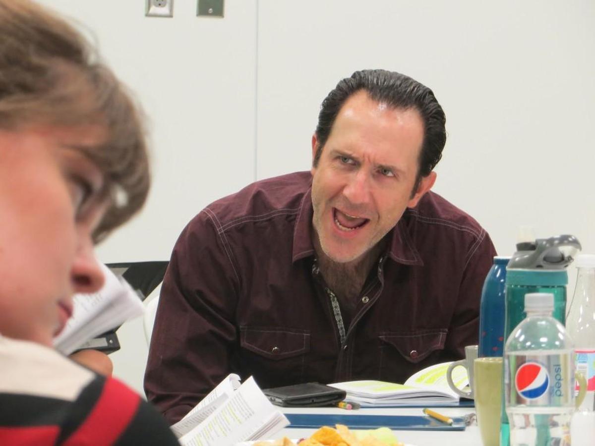 Jake (Brian Paulette, in rehearsal), a violently jealous husband, has beaten his wife to the point of brain injury.