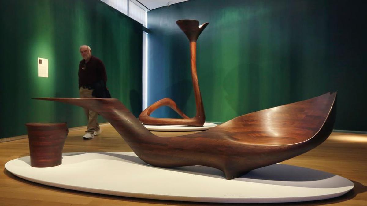 “Table-Chair-Stool” (foreground) and “Serpentine Floor Lamp” are among the works in the “Wendell Castle Remastered” exhibit at the Museum of Arts and Design in New York. Castle is a Kansas native and KU alum.