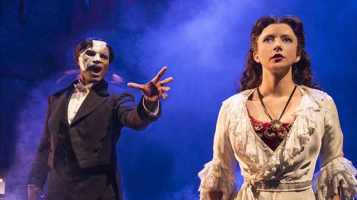 A rebooted “Phantom of the Opera” finds new magical devices for the Phantom (Derrick Davis) to lure ingenue Christine (Katie Travis) to his underground lair.