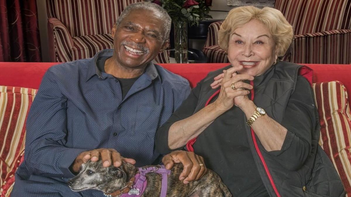 Charlie Robinson, who plays Hoke, and Michael Learned, who plays Daisy, take a break from “Driving Miss Daisy” rehearsal with Learned’s rescue dog, Penny.