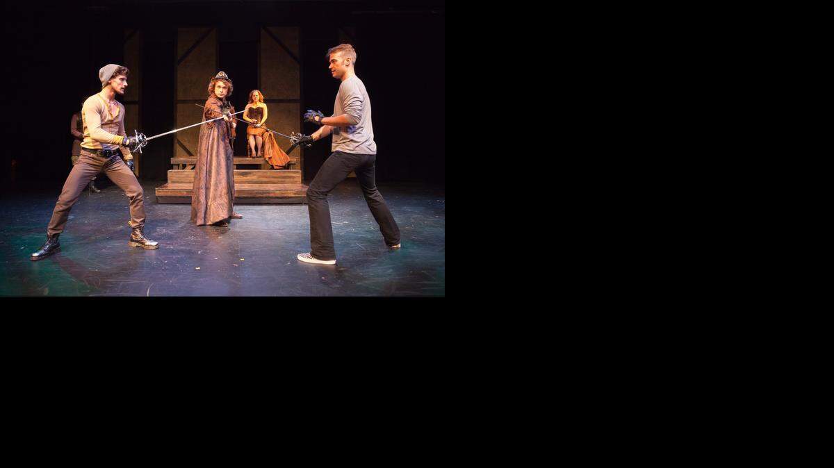 Laertes (Matt Lindblom, left) faces off with Hamlet (Jake Walker) as Osric (J. Will Fritz) referees and Queen Gertrude (Cinnamon Schultz) looks on in the conclusion of “Hamlet,” which is being presented by Kansas City Actors Theatre in repertory with “Rosencrantz and Guildenstern Are Dead.”