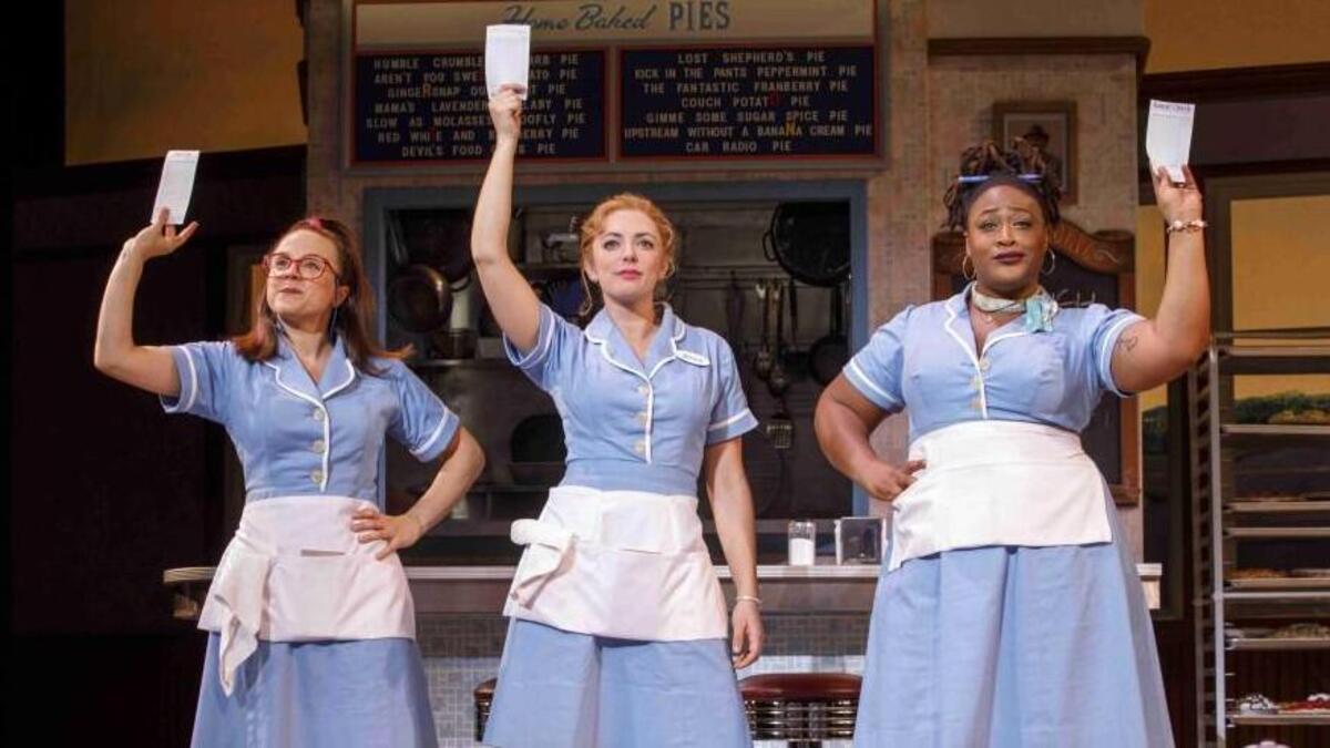 Jenna (Desi Oakley, center) has a support group in her fellow waitresses Dawn (Lenne Klingaman, left) and Becky (Charity Angel Dawson).