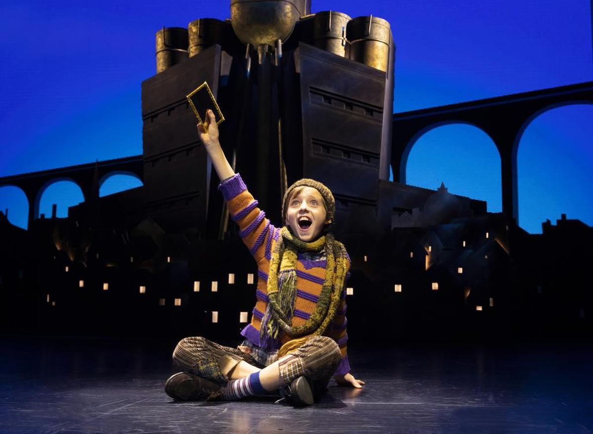 Charlie (Collin Jeffery) finds a golden ticket in “Charlie and the Chocolate Factory.”