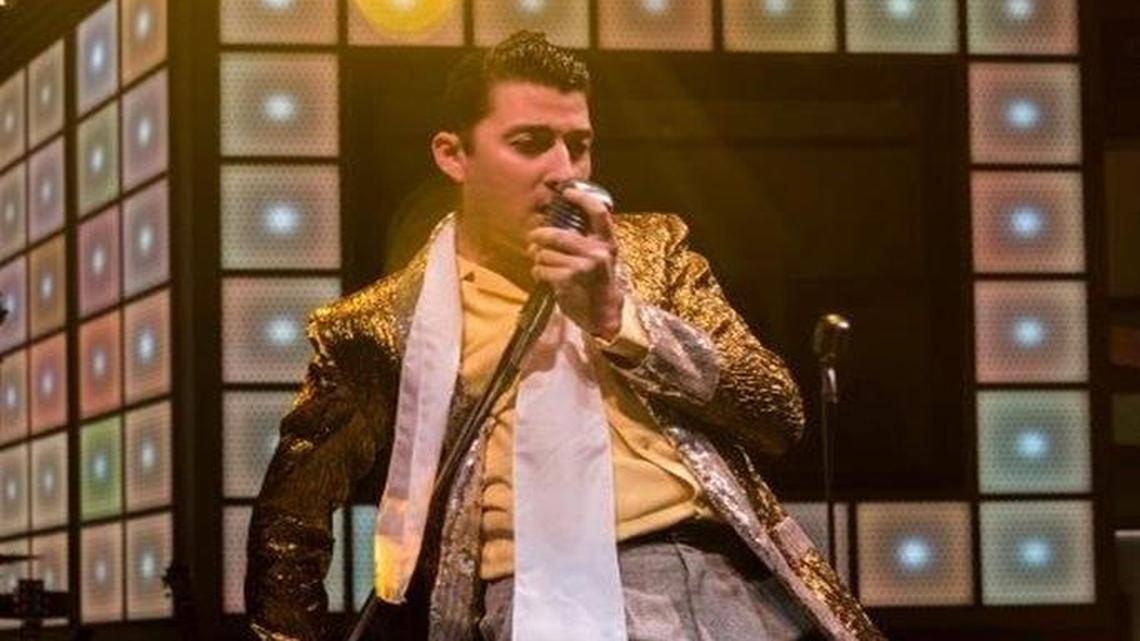 Elvis Presley (Skye Scott) shows his signature moves as he performs in “Million Dollar Quartet” at New Theatre Restaurant.