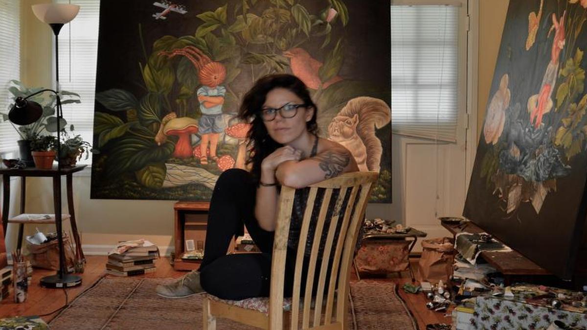 
Mexican artist Valerie Campos, here in her Lawrence studio, will display six large paintings in “Natural Selection: The Pursuit of Happiness,” which opens July 17 at the Lawrence Arts Center.
