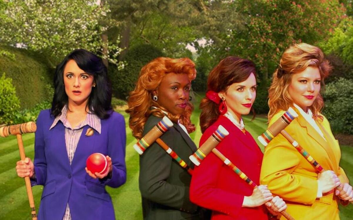 Katie Karel (from left) is Veronica and Chioma Anyanwu, Molly Denninghoff and Colleen Grate are the Heathers in the Unicorn Theatre’s production of “Heathers: The Musical,” based on the cult 1988 movie.
