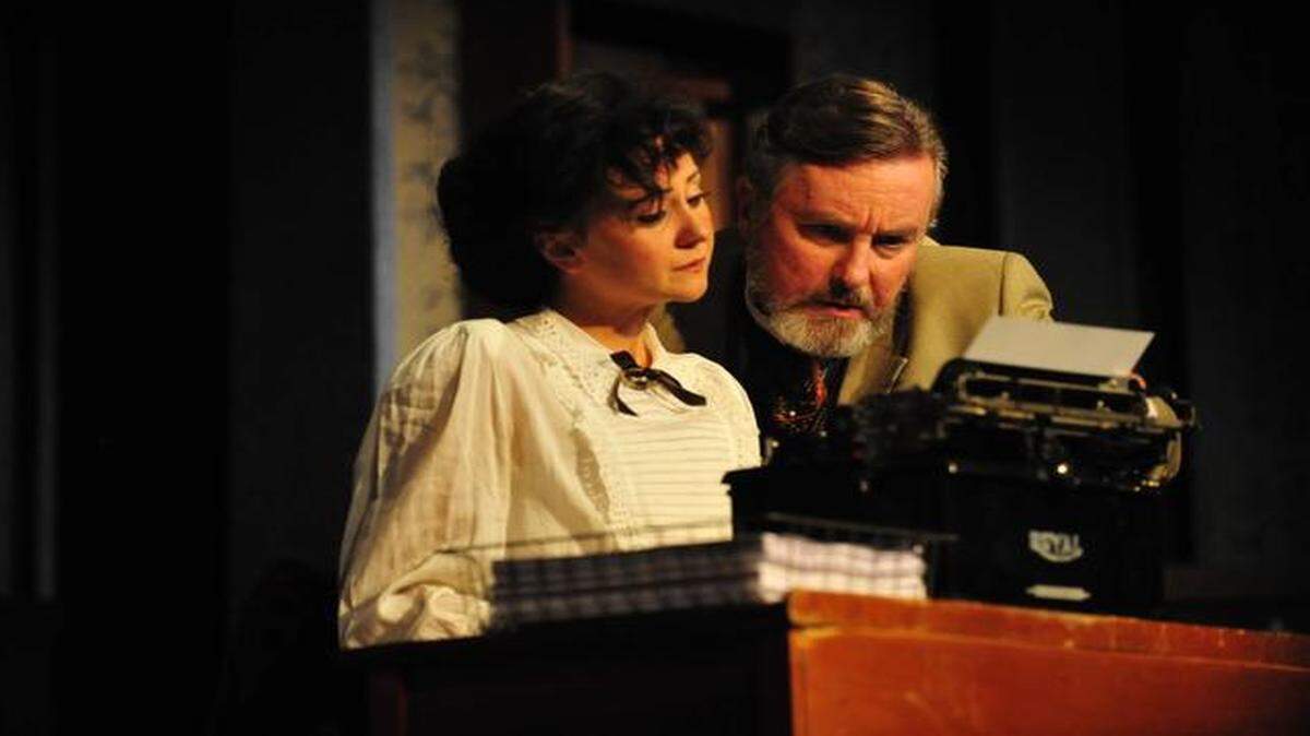 
In Spinning Tree Theatre’s production of “Ghost-Writer,” Myra (Katie Kalahurka) is hired as a typist but becomes a collaborator with novelist Frederick Woolsey (Robert Gibby Brand).
