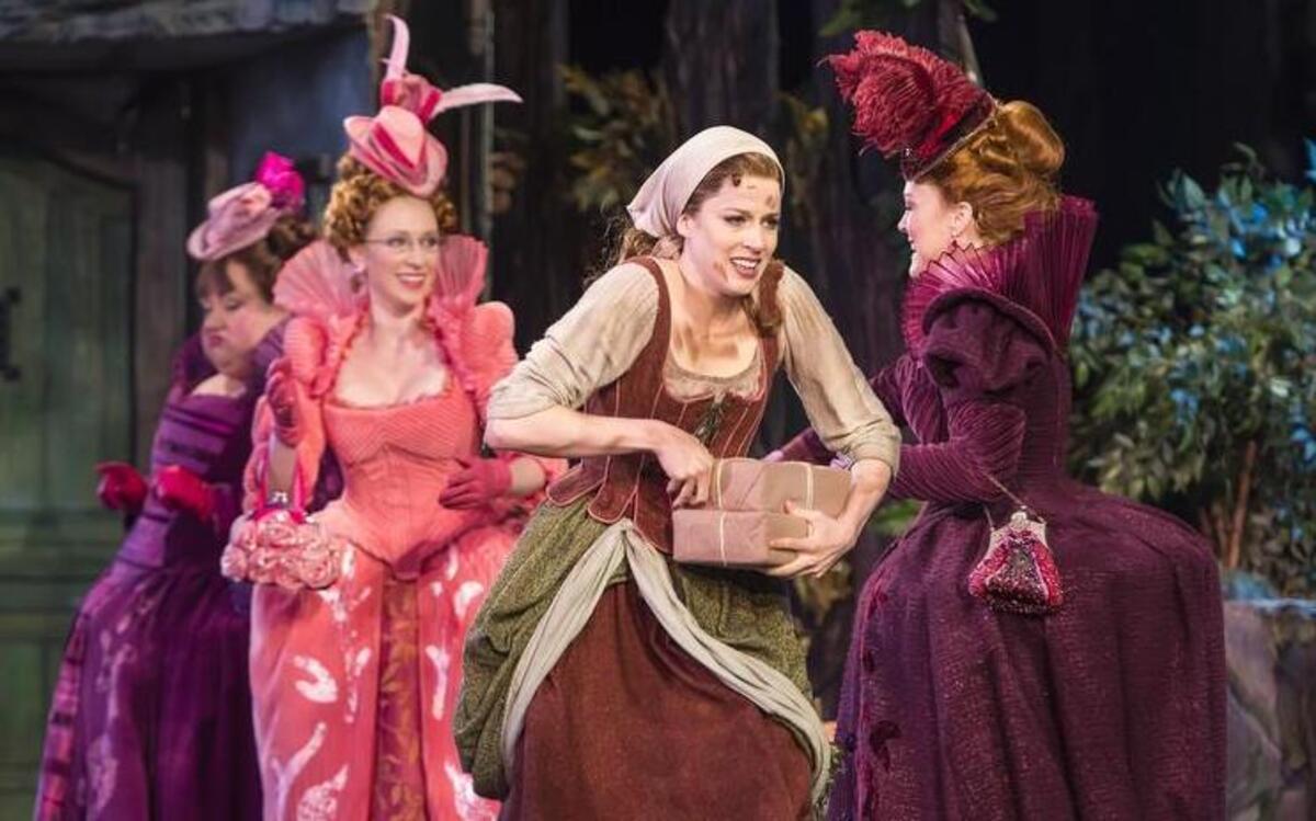 
Paige Faure (center) plays the title role in “Cinderella” with (from left) Aymee Garcia as Charlotte, Kaitlyn Davidson as Gabrielle and Beth Glover as Madame. The show opened Tuesday at Starlight Theatre.
