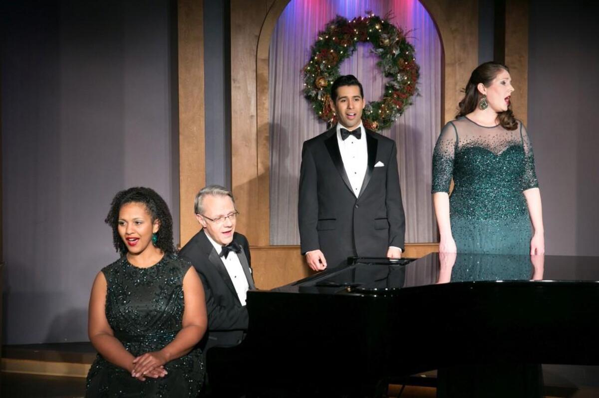 LaTeesha McDonald Jackson (from left), J. Kent Barnhart, Joseph Carr and Sarah LaBarr star in “Christmas in Song” at Quality Hill Playhouse.