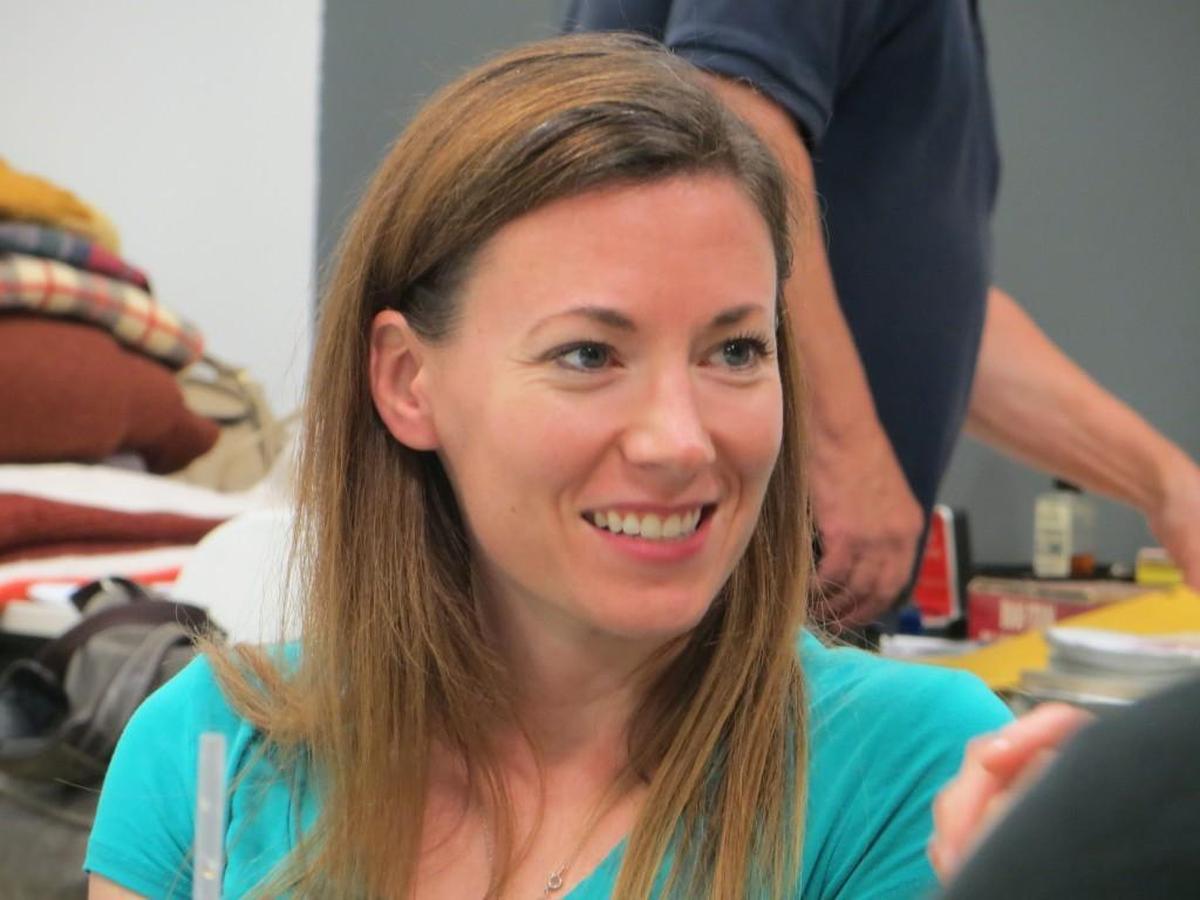 Beth (Christina Schafer, in rehearsal) is trying to recover from a brutal beating by her husband.