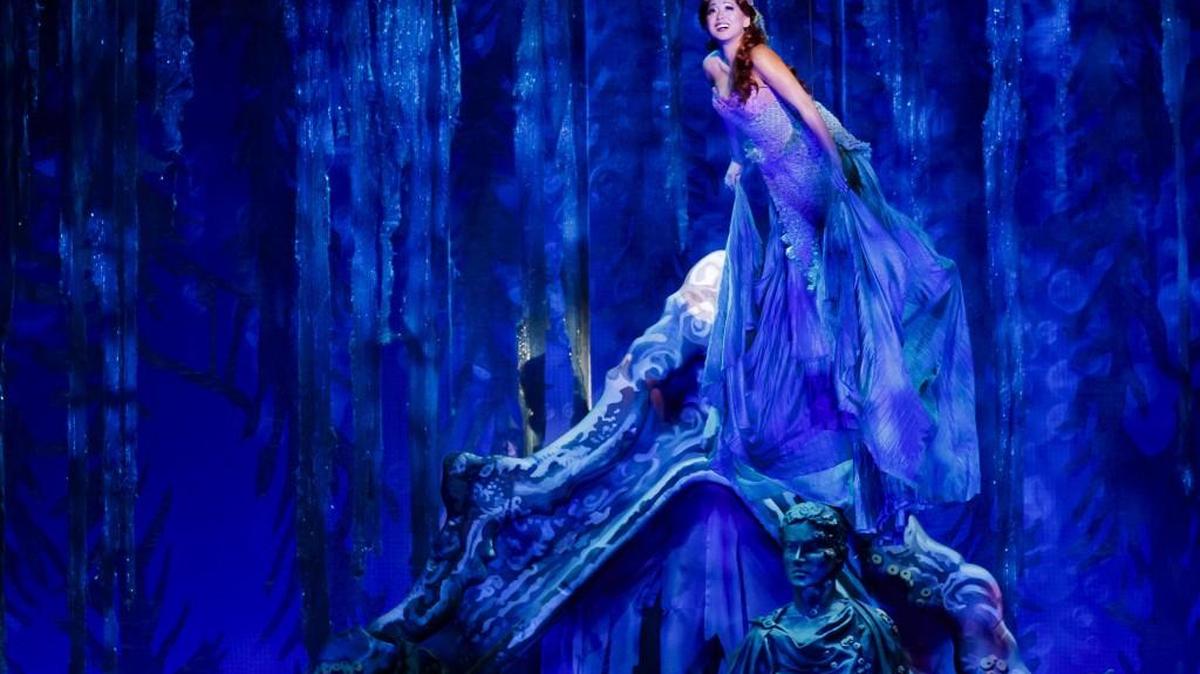 Ariel (Diana Huey) dreams of leaving her undersea home and walking among humans.