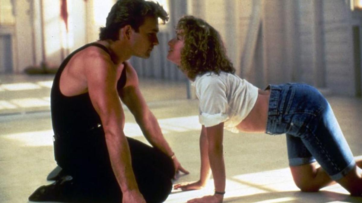 In this image provided by Lionsgate Home Entertainment, Patrick Swayze, portraying Johnny Castle, and Jennifer Grey, portraying Baby Houseman, are shown in a scene from the film, “Dirty Dancing.”