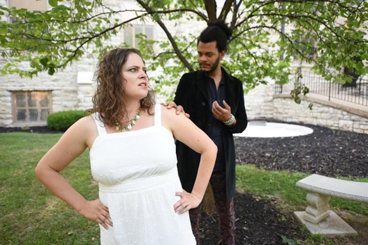 Hades (Calvin Arsenia), God of the Underworld, approaches the young maiden Persephone (Diana Edwin), intent on taking her away with him and making her his queen in “After Persephone: A Musical.”
