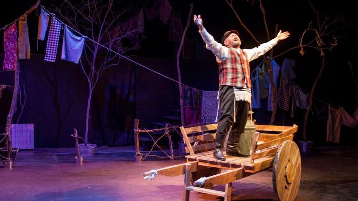 
Gary Neal Johnson sings “If I Were a Rich Man” as Tevye in Spinning Tree Theatre’s “Fiddler on the Roof.”
