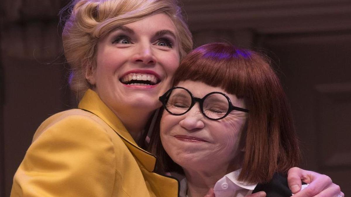 A housekeeper (Debra Jo Rupp, right) gets to know a flight attendant (Ashton Heyl), one of her boss’s many girlfriends.