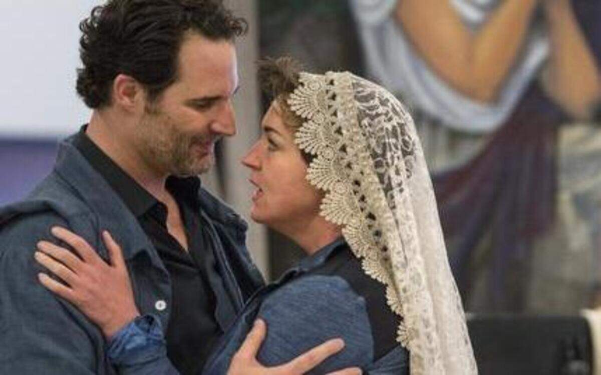 
James Valenti is Mario Cavaradossi and Melody Moore is Floria Tosca in the Lyric Opera’s production of “Tosca.” 
