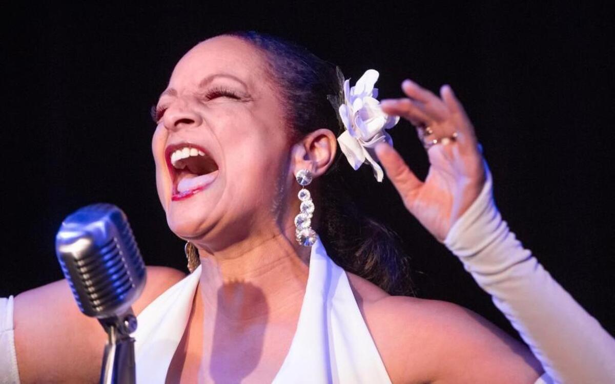 Billie Holiday (Nedra Dixon) recounts some of her life stories in “Lady Day at Emerson’s Bar and Grill,” a fictionalized play-with-music about one of her last performances. Spinning Tree Theatre’s production continues through Aug. 28 at the Living Room Theatre.