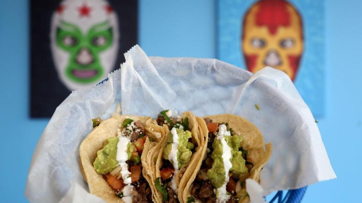 Here are three Carne Asada Tacos at the new Taco Luchador. “We are trying to make authentic, scratch-made Mexican food like Grandma made,” says owner Linda Bond.