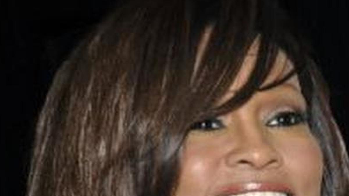
Singer Whitney Houston, left, and daughter Bobbi Kristina Brown arrive at an event in Beverly Hills, Calif. Brown, who was in hospice after months of receiving medical care, died on Sunday, July 26, 2015. 
