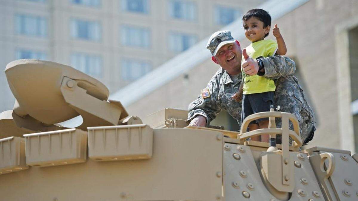 Children will get the chance to climb inside a variety of vehicles at the Touch-a-Truck event Sunday, July 15, at Overland Park Convention Center.