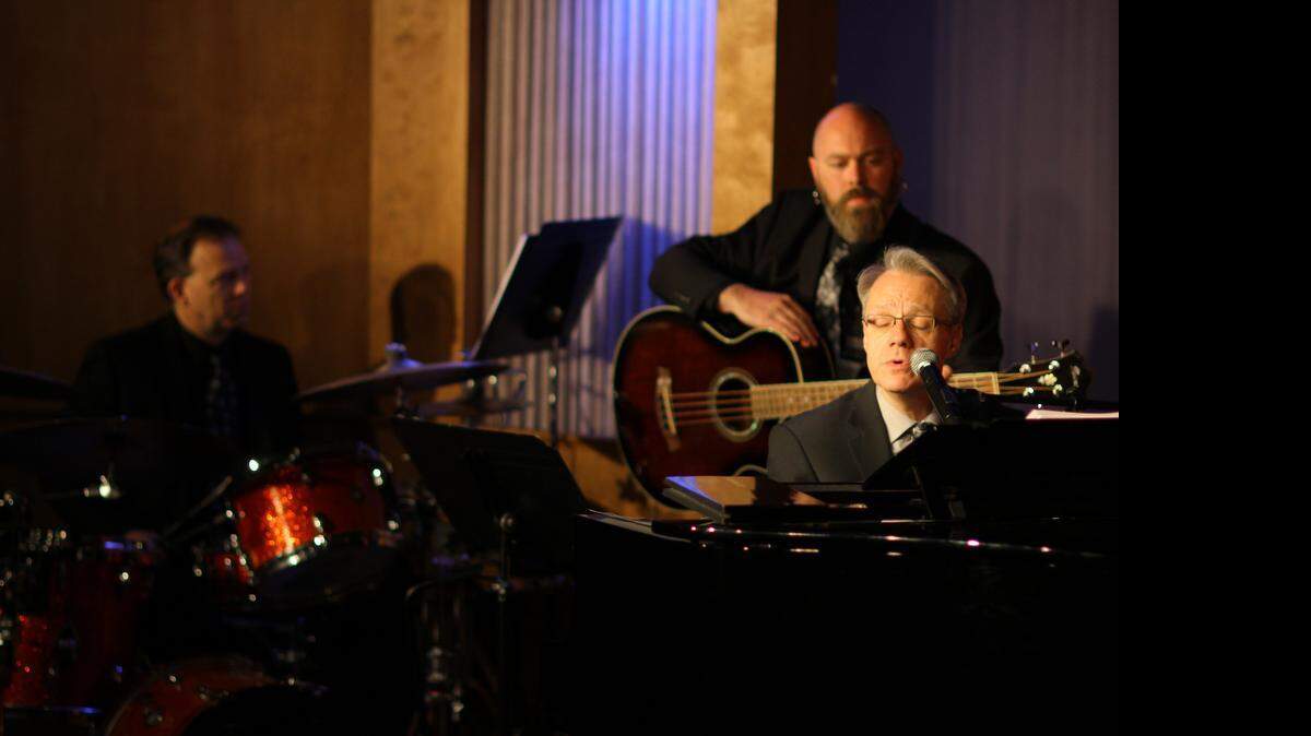 
Emcee J. Kent Barnhart performs in “What They Did for Love” with bassist Brian Wilson and drummer Ken Remmert.
