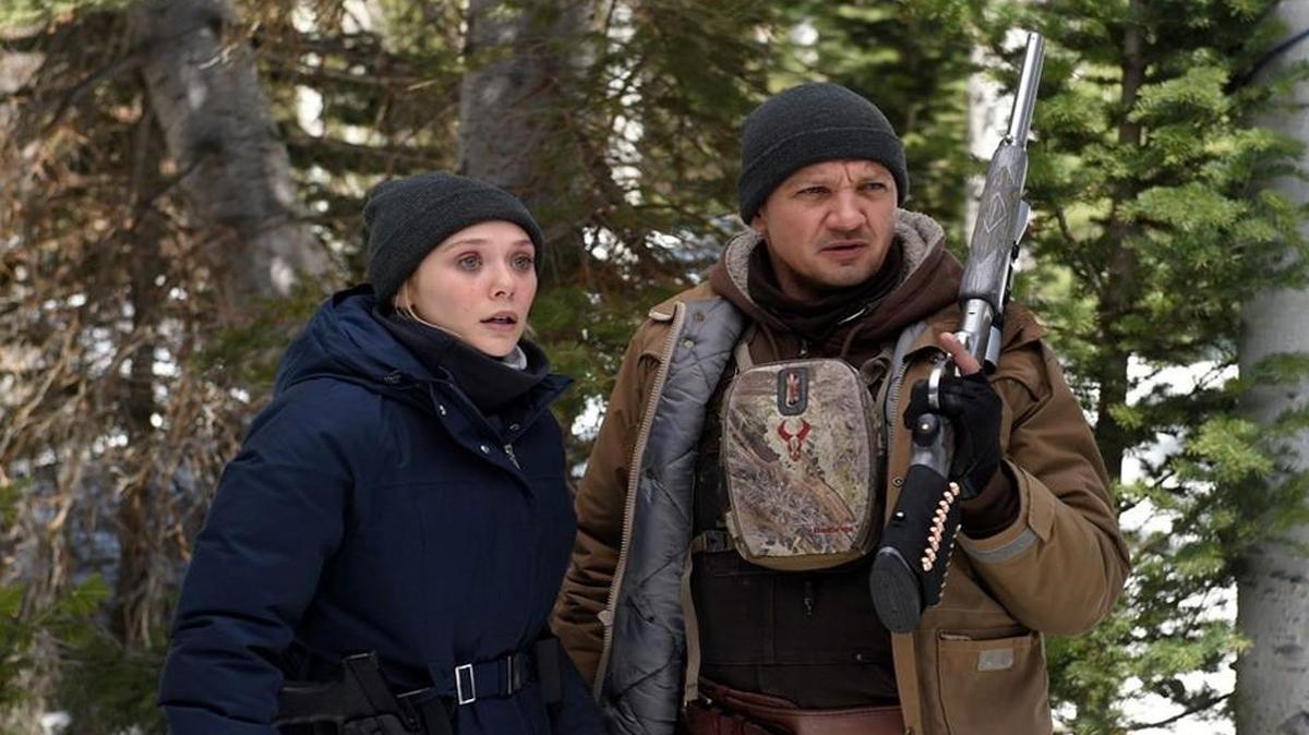 An FBI agent (Elizabeth Olsen) and a U.S. Fish and Wildlife Service tracker (Jeremy Renner) are trying to solve a murder mystery.