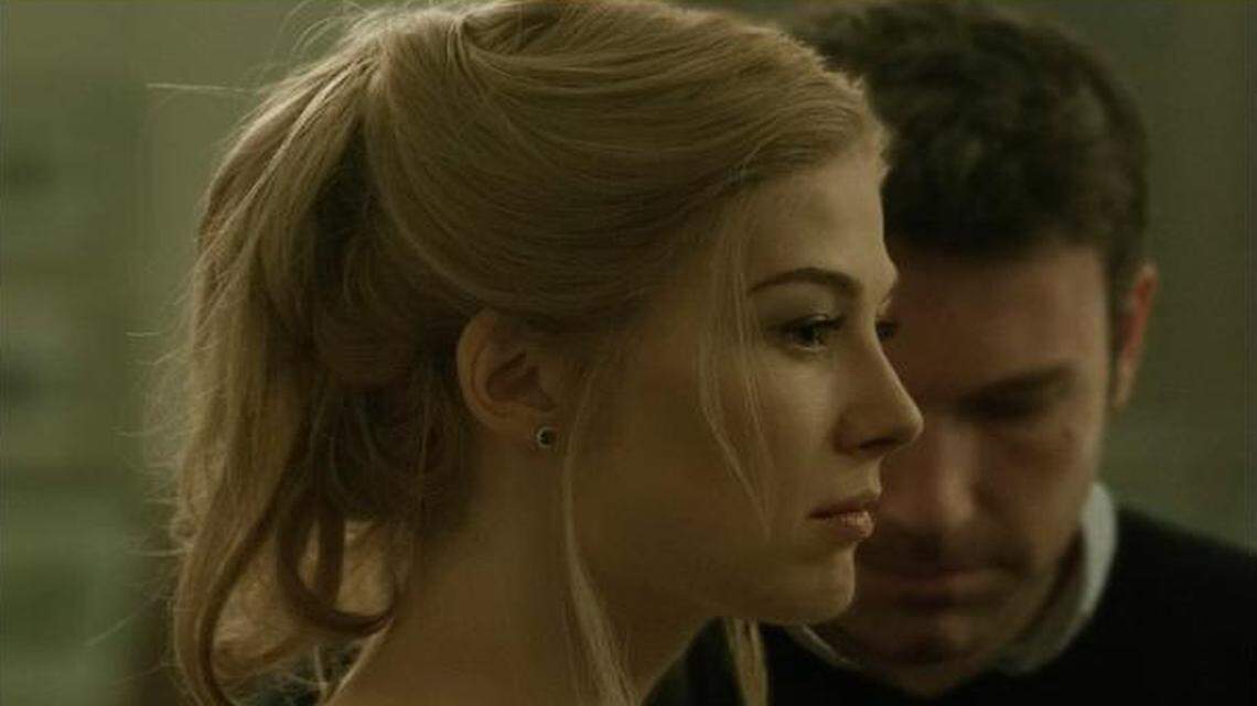 Rosamund Pike portrays Amy Dunne, whose mysterious disappearance turns her husband, played by Ben Affleck, into a possible murder suspect.