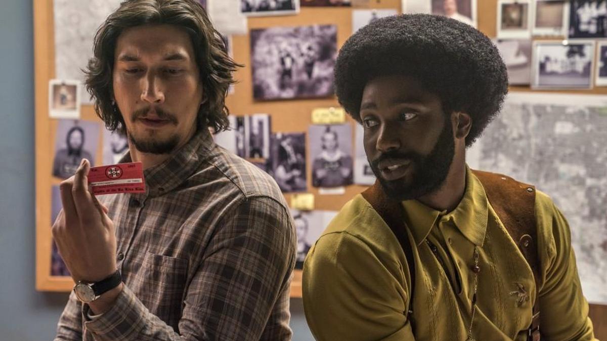 Flip Zimmerman (Adam Driver, left) and Ron Stallworth (John David Washington) undertake a daring undercover operation to infiltrate the KKK in “BlacKkKlansman.”