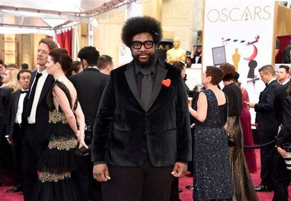 Questlove arrives at the Oscars on Sunday, Feb. 22, 2015, at the Dolby Theatre in Los Angeles. (Photo by Chris Pizzello/Invision/AP)