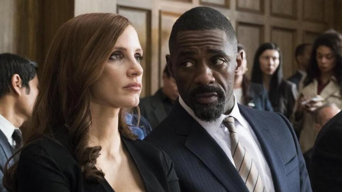 After being arrested by the FBI, Molly Bloom (Jessica Chastain) seeks help from New York lawyer Charlie Jaffey (Idris Elba) in “Molly’s Game.”