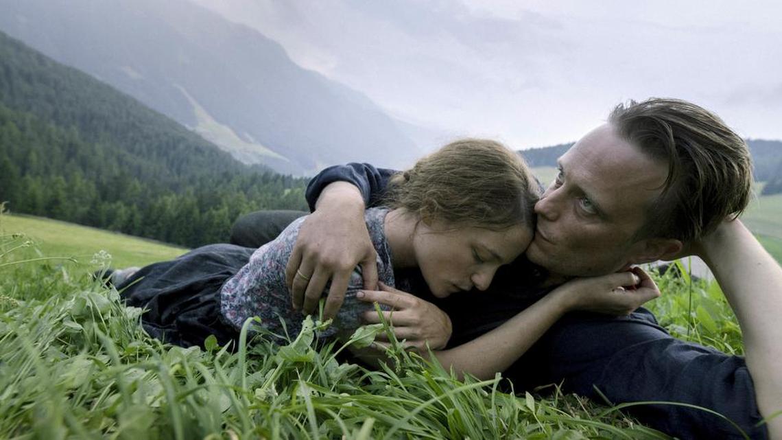 In “A Hidden Life,” an Austrian farmer (August Diehl) has an idyllic life with his wife (Valerie Pachner) – until the Nazis arrive.