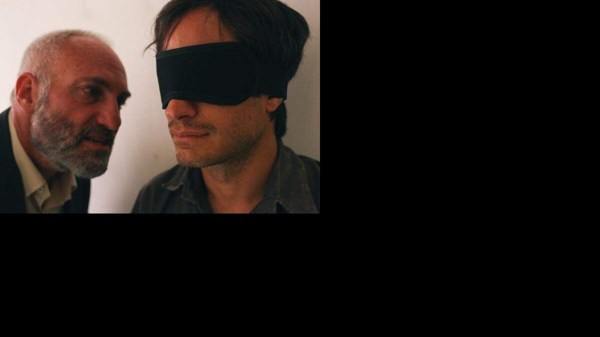 
Days after appearing on “The Daily Show,” journalist Maziar Bahari (Gael Garcia Bernal) was interrogated and tortured by a Revolutionary Guardsman he nicknamed Rosewater (Kim Bodnia), for his cologne.
