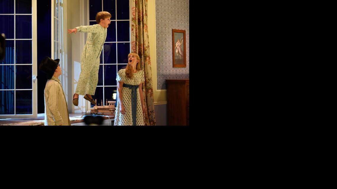 
Pictured: (l-r) Jake Lucas as John Darling, John Allyn as Michael Darling, and Taylor Louderman as Wendy Darling. 
