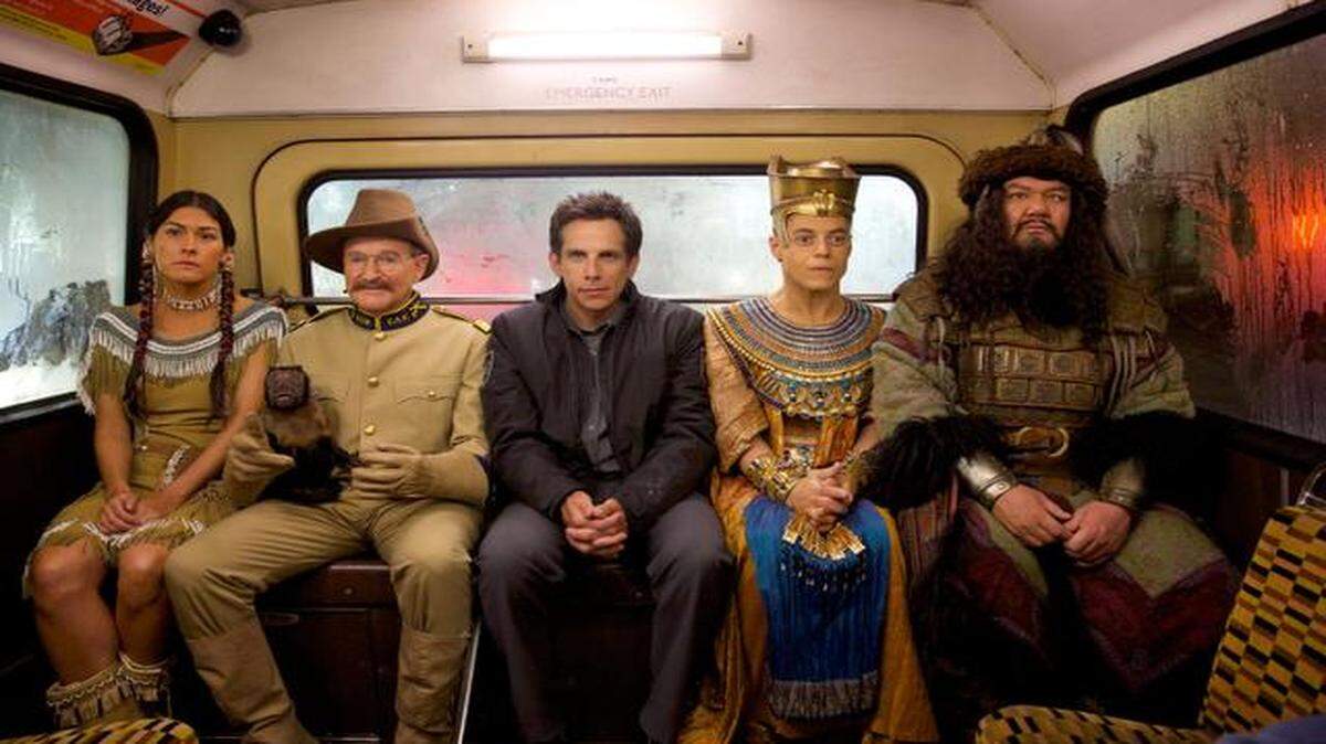 
From left: Sacajawea (Mizuo Peck), Teddy Roosevelt (Robin Williams), Larry Daley (Ben Stiller), Ahkmenrah (Rami Malek) and Atilla the Hun (Patrick Gallagher) have a rare moment of quiet during the globetrotting adventures. 
