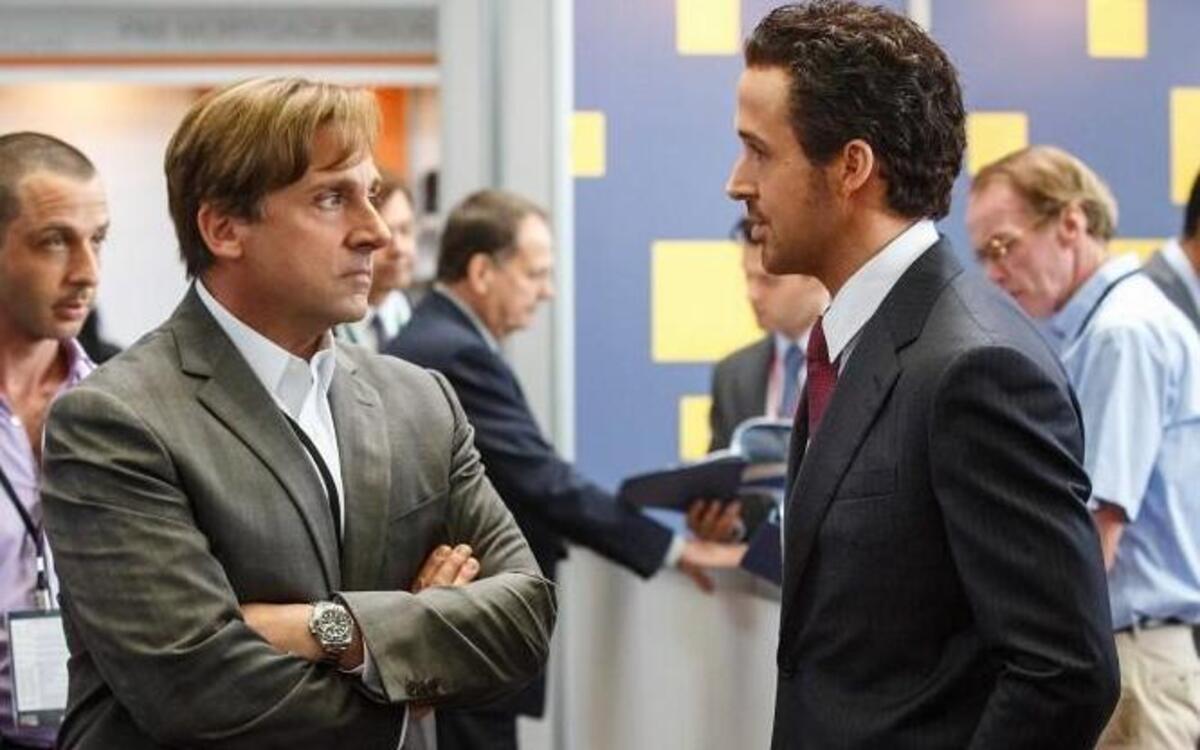 A brash-talking banker (Ryan Gosling, right) persuades a hedge fund manager (Steve Carell) to join his get-rich scheme, but the manager soon has moral qualms.