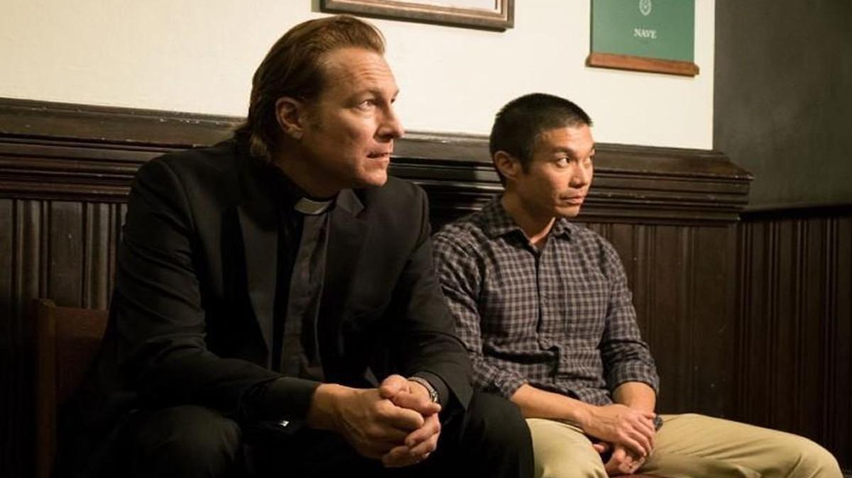 The Rev. Michael Spurlock (John Corbett) and Ye Win (played by Nelson Lee) await a decision about the future of their church in “All Saints.”