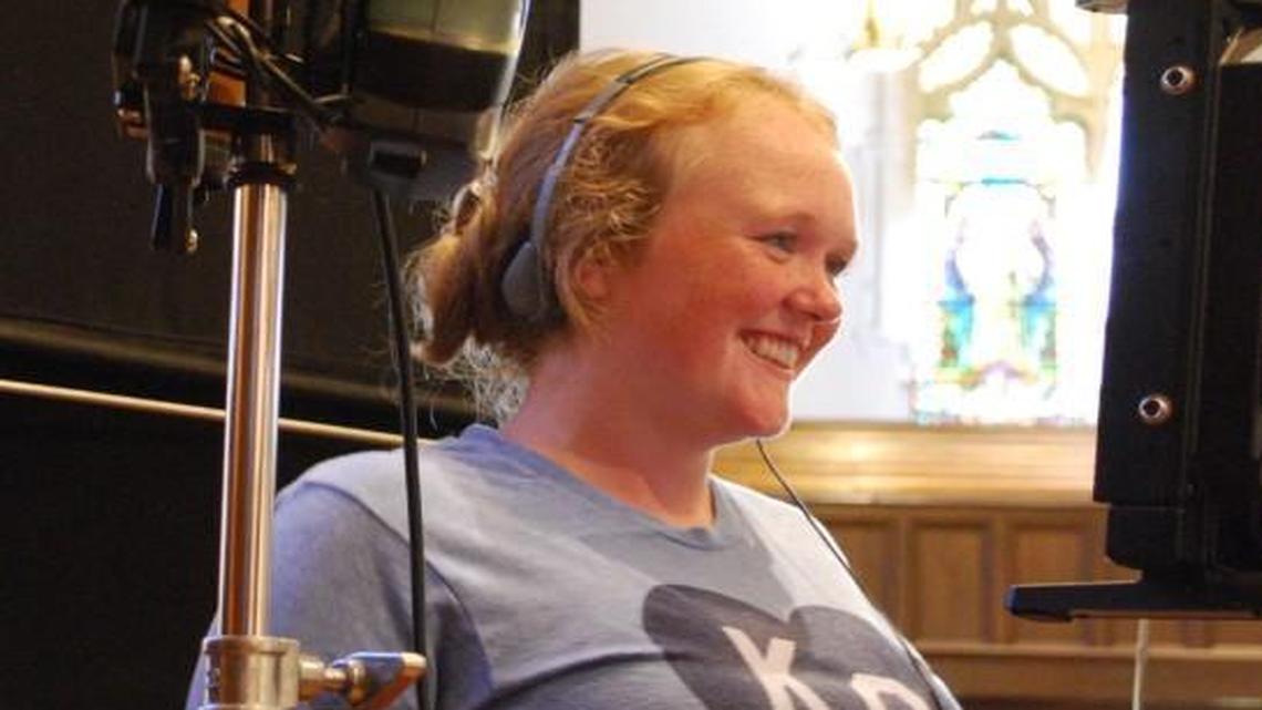 KC native Morgan Dameron brought her cast and crew to Country Club Christian Church to shoot a pivotal scene for “Different Flowers,” which she wrote and is directing. With her are assistant cameraman Jordon Rioux (left) and director of photography Jordan McNeile.