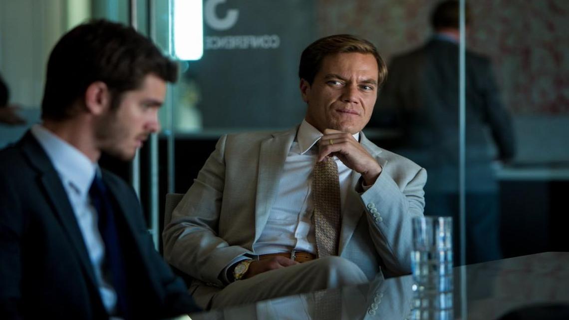 
A Florida real estate operator (Michael Shannon, right) preys on a homeowner (Andrew Garfield).
