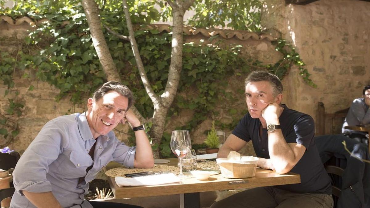 Rob Brydon (left) and Steve Coogan play slightly fictional versions of themselves in “The Trip to Spain.”