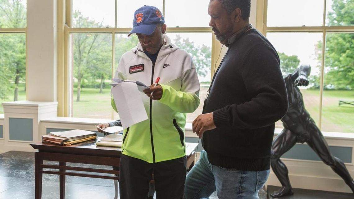 Kevin Willmott (right), a professor at the University of Kansas, was updating the script of “Chi-Raq” as the movie, directed by Spike Lee (left), was being filmed.