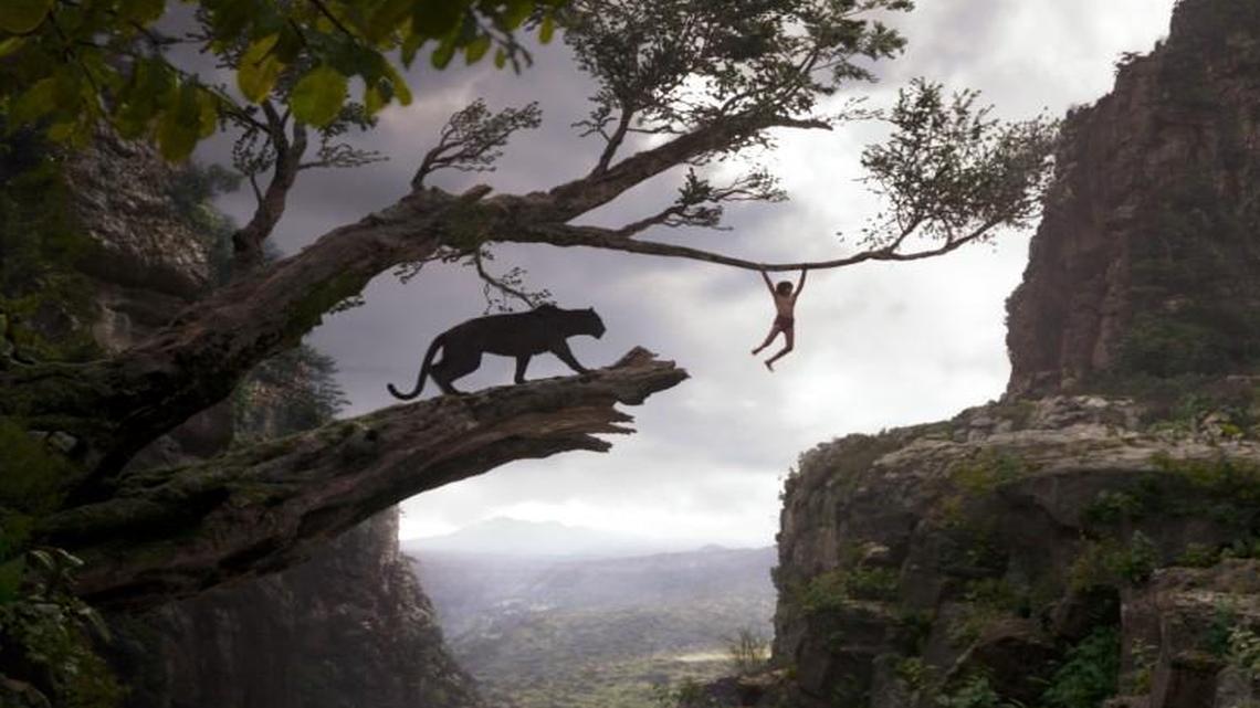 Bagheera the panther (voiced by Ben Kingsley) escorts young Mowgli (Neel Sethi) through the jungle. Only the boy is real; the rest was created digitally in downtown Los Angeles.