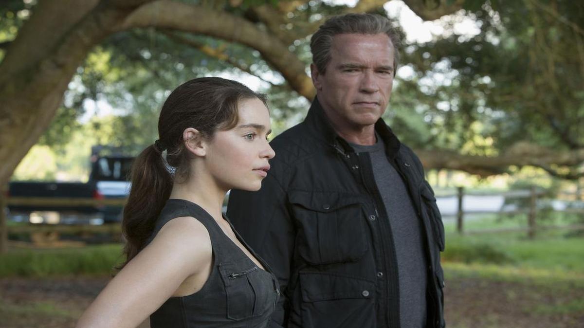 
 Emilia Clarke plays Sarah Connor and Arnold Schwarzenegger plays the Terminator in “Terminator Genisys”
